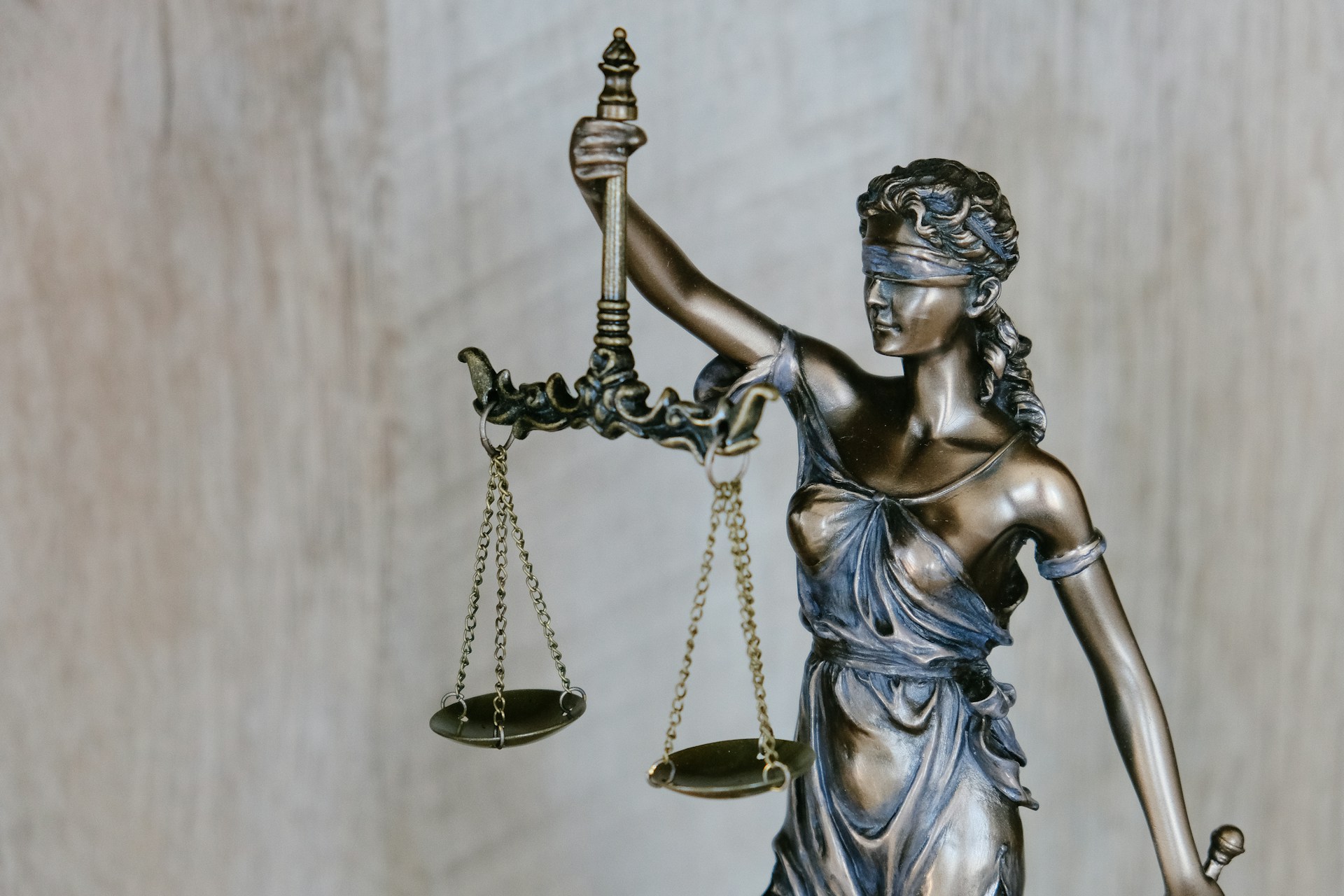 Scales of justice — symbol of the courts where episodes' trials were heard