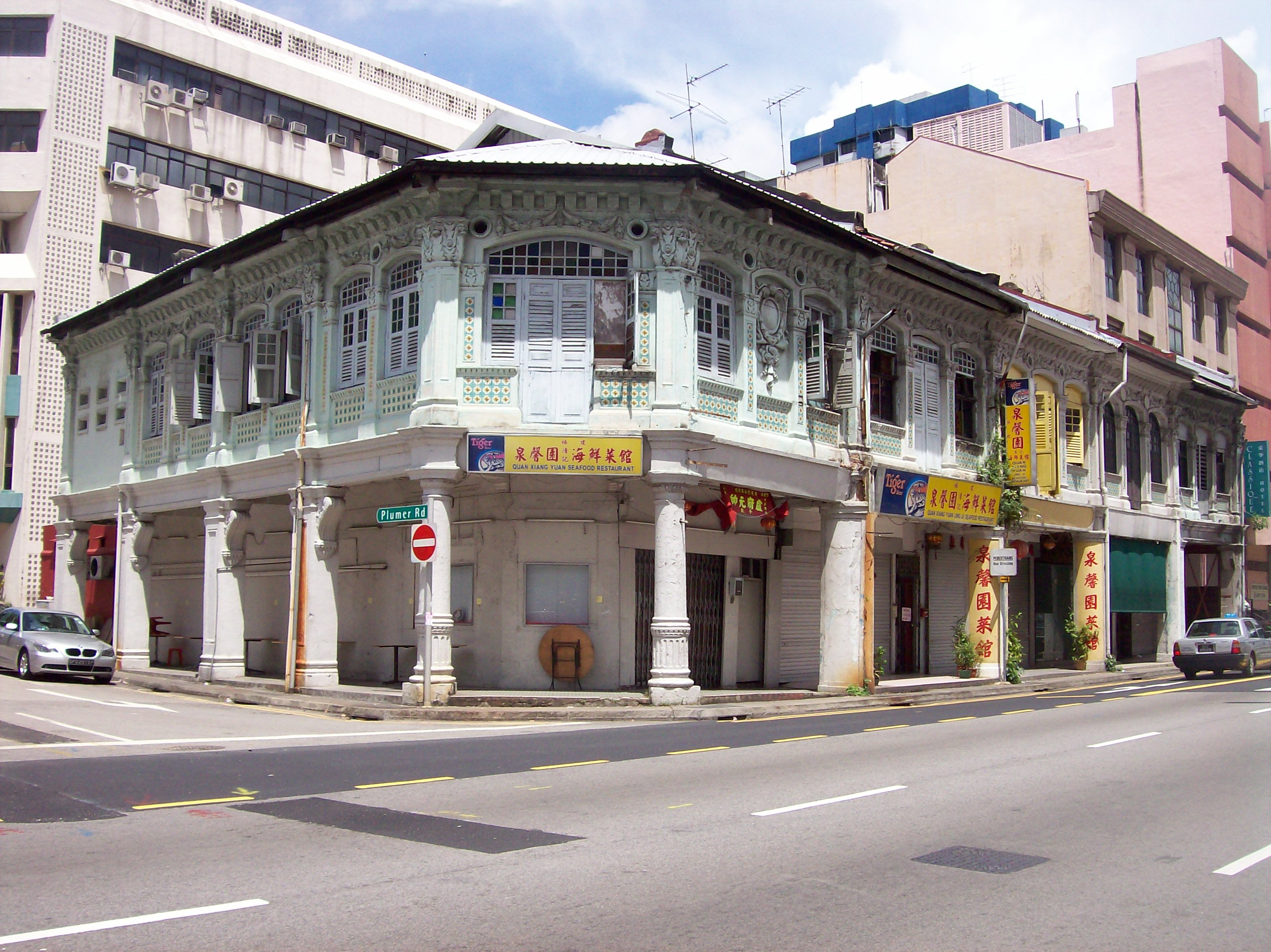 Colourful shophouse row along a Singapore street in the Jalan Besar quarter